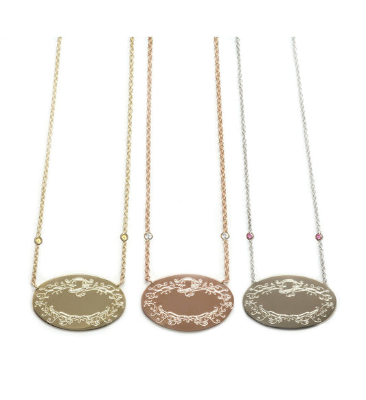 Small Signature Pendant Flanked by Two Precious Stones