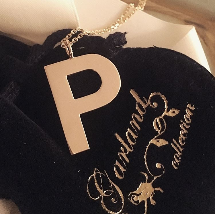Medium Initial Charm